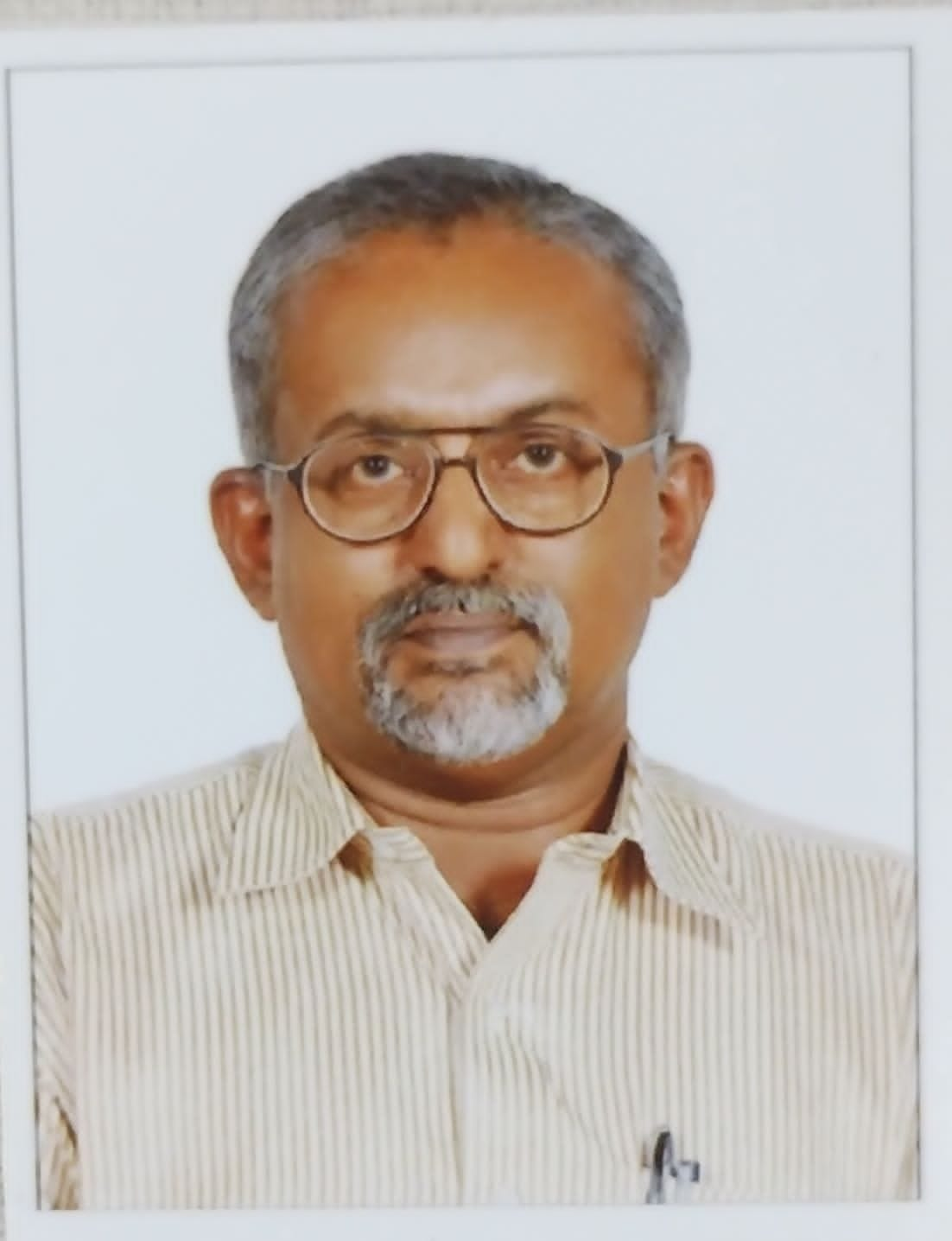 Dr. Tharian George Kadavil